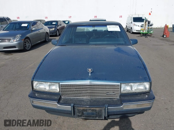 1986 Cadillac Seville z VIN 1G6KS6989GU813079, wystawiony jako IAAI lot #41732353 z przebiegiem Nie podano mil oraz . Historia ofert i sprzedaży dostępna na DreamBid. Obrazek 6.