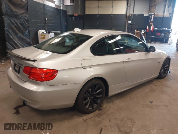 2011 BMW 3 Series 335i xDrive with VIN WBAKF9C56BE261882, listed as a IAAI auction lot 42393269 with 131,000 mi miles and . Bid and sale history available at DreamBid. Image 4.