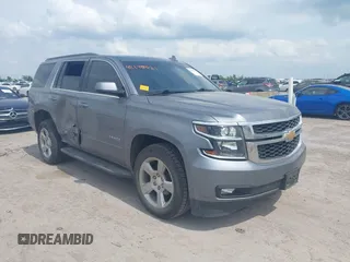 2019 Chevrolet Tahoe LT with VIN 1GNSCBKC8KR406519, listed as a IAAI auction lot 42145021 with 74,694 mi miles and . Bid and sale history available at DreamBid. Image 1.
