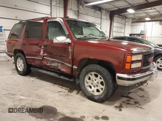 1999 GMC Yukon with VIN 1GKEK13R3XJ700930, listed as a IAAI auction lot 40915481 with 249,773 mi miles. Bid and sale history available at carsss.com. Image 1.