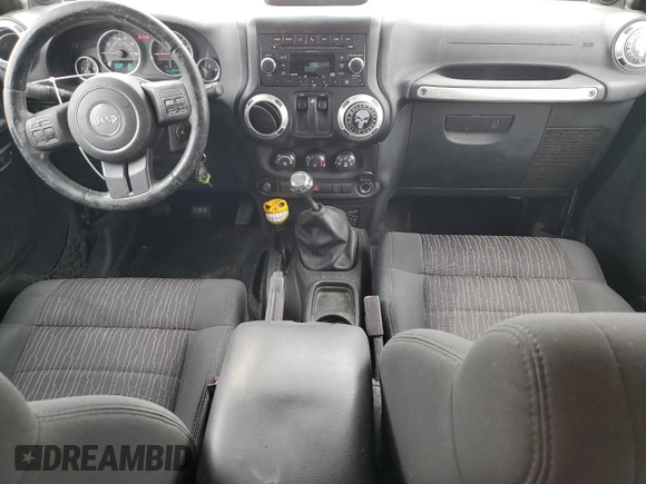 2011 Jeep Wrangler Rubicon with VIN 1J4BA6D15BL585388, listed as a Copart auction lot 76272184 with 119,043 mi miles and Clean title. Bid and sale history available at DreamBid. Image 8.