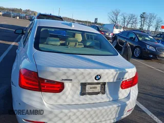 2014 BMW 3 Series 328i xDrive with VIN WBA3B5G58ENS08415, listed as a IAAI auction lot 41642668 with 51,563 mi miles and . Bid and sale history available at DreamBid. Image 16.