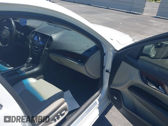 2016 Cadillac ATS Luxury Collection RWD z VIN 1G6AB5RX4G0133529, wystawiony jako IAAI lot #42314146 z przebiegiem 158 897 mil mil oraz . Historia ofert i sprzedaży dostępna na DreamBid. Obrazek 5.