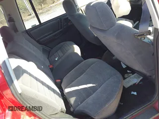 1996 Jeep Grand Cherokee Laredo with VIN 1J4EX58S8TC122302, listed as a IAAI auction lot 41218573 with 195,392 mi miles. Bid and sale history available at carsss.com. Image 8.