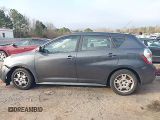 2009 Pontiac Vibe w/1SB with VIN 5Y2SP67059Z460115, listed as a IAAI auction lot 41480483 with 201,245 mi miles. Bid and sale history available at carsss.com. Image 14.