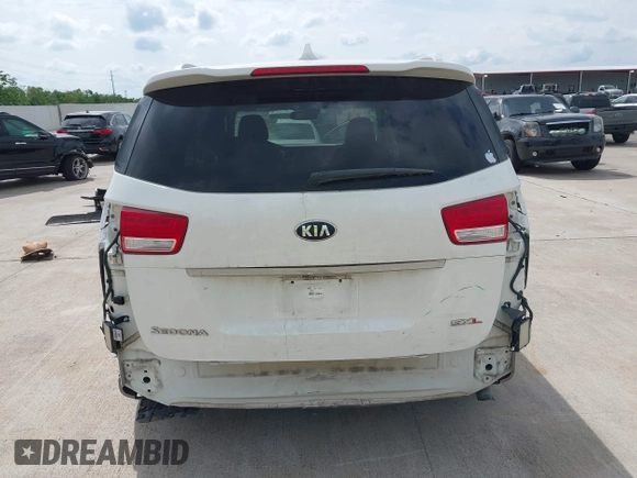 2015 Kia Sedona SX-L with VIN KNDME5C12F6028893, listed as a IAAI auction lot 42109514 with 169,303 mi miles and . Bid and sale history available at DreamBid. Image 16.
