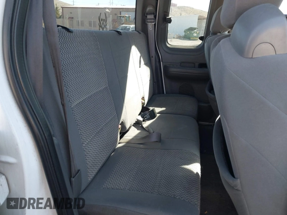 2002 Ford F-150 XL with VIN 1FTRX17W22KE34494, listed as a IAAI auction lot 41689313 with 250,243 mi miles. Bid and sale history available at carsss.com. Image 8.