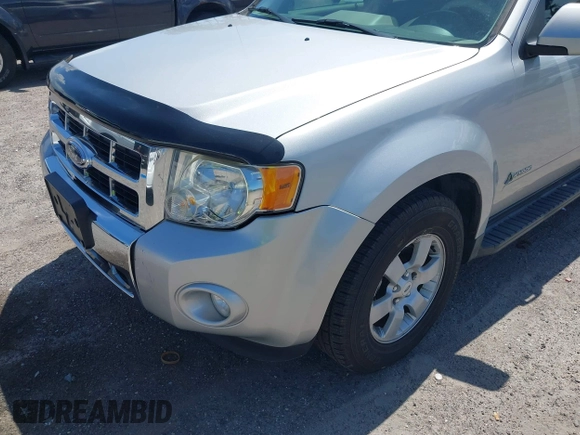2009 Ford Escape Hybrid z VIN 1FMCU593X9KA59775, wystawiony jako IAAI lot #42763464 z przebiegiem 142 396 mil mil oraz . Historia ofert i sprzedaży dostępna na DreamBid. Obrazek 6.