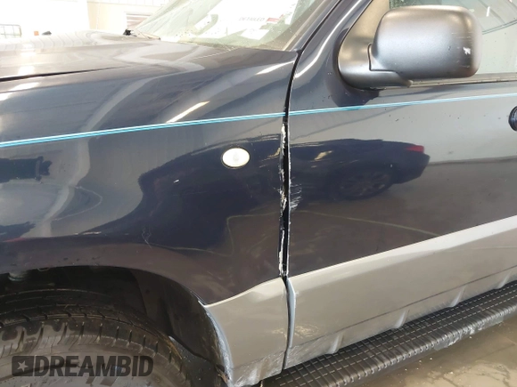 2003 Mercury Mountaineer Convenience z VIN 4M2ZU86W03UJ16828, wystawiony jako IAAI lot #41580919 z przebiegiem 148 968 mil mil oraz . Historia ofert i sprzedaży dostępna na DreamBid. Obrazek 18.