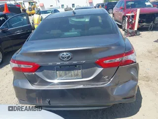 2019 Toyota Camry LE z VIN 4T1B11HK4KU797720, wystawiony jako IAAI lot #42053830 z przebiegiem 102 558 mil mil oraz . Historia ofert i sprzedaży dostępna na DreamBid. Obrazek 16.