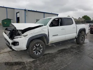 2020 Toyota Tacoma SR5 with VIN 3TMCZ5AN5LM318062, listed as a Copart auction lot 54399785 with 67,399 mi miles and Salvage title. Bid and sale history available at DreamBid. Image 1.