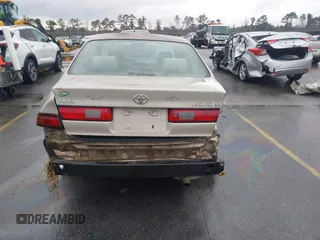 1997 Toyota Camry LE z VIN 4T1BG22K9VU786181, wystawiony jako IAAI lot #41610928 z przebiegiem 338 829 mil mil oraz . Historia ofert i sprzedaży dostępna na DreamBid. Obrazek 16.