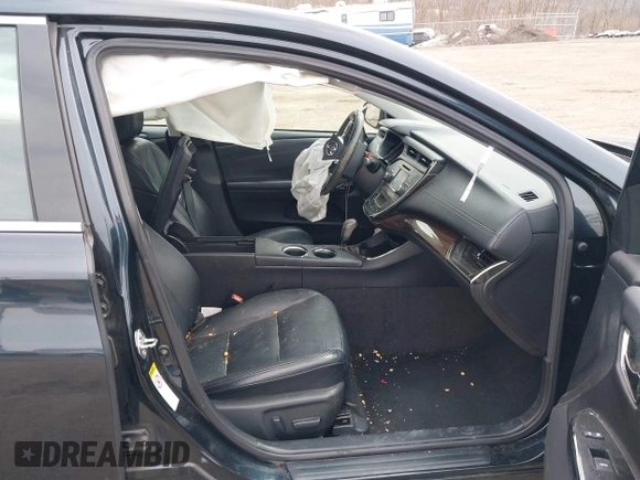 2015 Toyota Avalon Limited with VIN 4T1BK1EB1FU170934, listed as a IAAI auction lot 41618031 with 124,854 mi miles and . Bid and sale history available at DreamBid. Image 5.