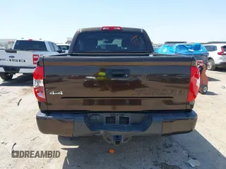 2018 Toyota Tundra SR5 z VIN 5TFAW5F18JX699080, wystawiony jako IAAI lot #42242945 z przebiegiem Nie podano mil oraz . Historia ofert i sprzedaży dostępna na DreamBid. Obrazek 16.