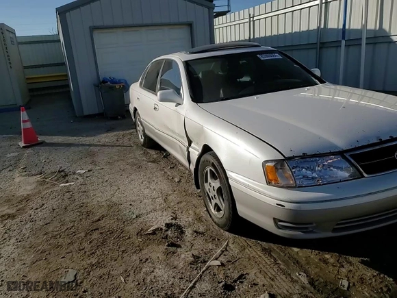 1999 Toyota Avalon XL with VIN 4T1BF18B3XU310192, listed as a Copart auction lot 85969084 with NaN miles and Salvage Title. Bid and sale history available at carsss.com. Image 11.