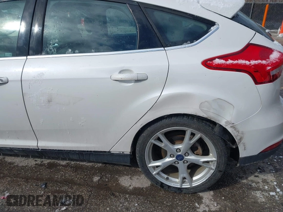 2015 Ford Focus Titanium с VIN 1FADP3N26FL232639, выставлен на аукционе IAAI как лот 41699403 с пробегом 86 870 миль миль и . История ставок и продаж доступна на DreamBid. Изображение 6.