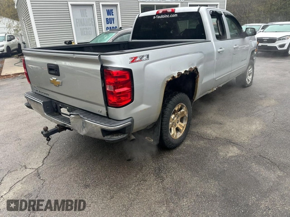 2015 Chevrolet Silverado 1500 LT with VIN 1GCVKRECXFZ221116, listed as a Copart auction lot 56621055 with 198,583 mi miles and Clean Title. Bid and sale history available at DreamBid. Image 4.