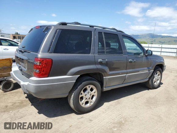 2000 Jeep Grand Cherokee Laredo with VIN 1J4G248S6YC333068, listed as a Copart auction lot 54972765 with 183,775 mi miles and Clean title. Bid and sale history available at DreamBid. Image 3.