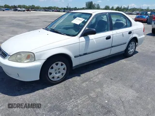 2000 Honda Civic LX z VIN 1HGEJ6679YL019958, wystawiony jako IAAI lot #42328269 z przebiegiem 217 961 mil mil oraz . Historia ofert i sprzedaży dostępna na DreamBid. Obrazek 2.