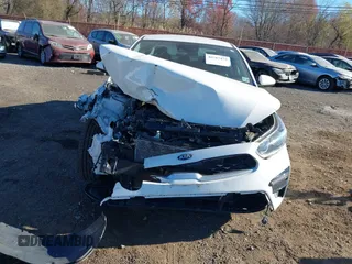 2019 Kia Forte LXS z VIN 3KPF24AD9KE125019, wystawiony jako IAAI lot #40787475 z przebiegiem 54 777 mil mil oraz . Historia ofert i sprzedaży dostępna na DreamBid. Obrazek 12.