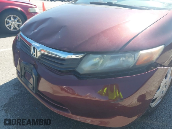 2012 Honda Civic LX z VIN 19XFB2F56CE084744, wystawiony jako IAAI lot #42077087 z przebiegiem 177 263 mil mil oraz . Historia ofert i sprzedaży dostępna na DreamBid. Obrazek 6.