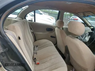 1997 Saturn SW z VIN 1G8ZK827XVZ120119, wystawiony jako Copart lot #57083245 z przebiegiem 199 971 mil mil oraz Szkody całkowita. Historia ofert i sprzedaży dostępna na DreamBid. Obrazek 10.