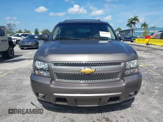 2012 Chevrolet Suburban LT with VIN 1GNSKJE72CR130111, listed as a IAAI auction lot 42699365 with 216,827 mi miles and . Bid and sale history available at DreamBid. Image 12.