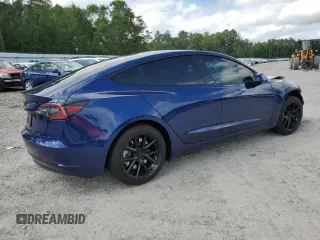 2023 Tesla Model 3 z VIN 5YJ3E1EA6PF692248, wystawiony jako Copart lot #58831805 z przebiegiem 18 607 mil mil oraz Szkoda całkowita • Salvage title. Historia ofert i sprzedaży dostępna na DreamBid. Obrazek 3.