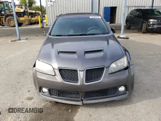2009 Pontiac G8 GT z VIN 6G2EC57Y59L155670, wystawiony jako Copart lot #52409435 z przebiegiem 117 139 mil mil oraz Szkoda całkowita • Salvage title. Historia ofert i sprzedaży dostępna na DreamBid. Obrazek 5.