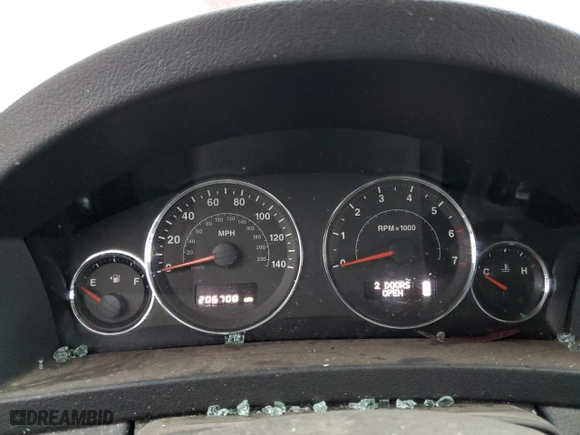 2009 Jeep Grand Cherokee Laredo with VIN 1J8GR48K09C548828, listed as a Copart auction lot 85113664 with 206,708 mi miles and Salvage Title. Bid and sale history available at carsss.com. Image 9.