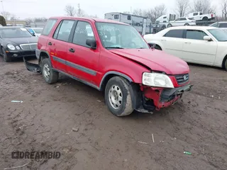 1999 Honda CR-V LX with VIN JHLRD184XXC084140, listed as a IAAI auction lot 41566574 with 206,522 mi miles. Bid and sale history available at carsss.com. Image 1.