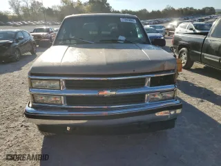 1996 Chevrolet Tahoe with VIN 1GNEK13R1TJ385350, listed as a Copart auction lot 77593884 with 169,178 mi miles and Salvage Title. Bid and sale history available at carsss.com. Image 5.