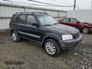 1999 Honda CR-V EX with VIN JHLRD1867XC012913, listed as a Copart auction lot 73193224 with 198,853 mi miles and Clean Title. Bid and sale history available at carsss.com. Image 4.
