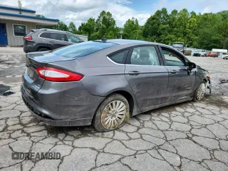 2013 Ford Fusion SE Hybrid with VIN 3FA6P0LU2DR329816, listed as a Copart auction lot 64308255 with 217,157 mi miles and Salvage title. Bid and sale history available at DreamBid. Image 3.