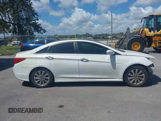 2014 Hyundai Sonata SE with VIN 5NPEC4AC0EH875408, listed as a IAAI auction lot 41913833 with 87,001 mi miles and . Bid and sale history available at DreamBid. Image 14.