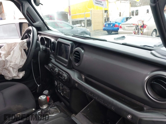 2023 Jeep Wrangler Sport with VIN 1C4HJXDN5PW522855, listed as a IAAI auction lot 41516522 with 49,607 mi miles and . Bid and sale history available at DreamBid. Image 5.
