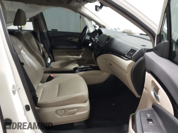 2019 Honda Pilot Touring 7-Passenger with VIN 5FNYF6H64KB005798, listed as a IAAI auction lot 41551933 with 103,151 mi miles. Bid and sale history available at carsss.com. Image 5.