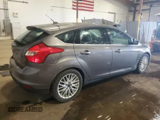 2014 Ford Focus Titanium z VIN 1FADP3N27EL462950, wystawiony jako Copart lot #65207155 z przebiegiem 34 058 mil mil oraz Szkoda całkowita • Salvage title. Historia ofert i sprzedaży dostępna na DreamBid. Obrazek 3.