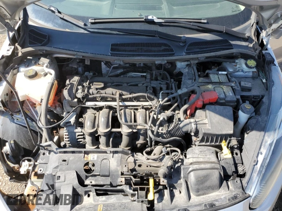 2015 Ford Fiesta SE z VIN 3FADP4EJ0FM212740, wystawiony jako Copart lot #63944573 z przebiegiem 123 037 mil mil oraz Szkoda całkowita • Salvage title. Historia ofert i sprzedaży dostępna na DreamBid. Obrazek 11.