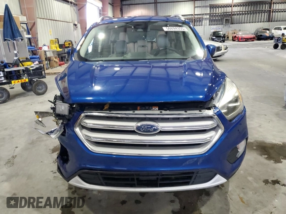 2019 Ford Escape Titanium с VIN 1FMCU0J91KUB47689, выставлен на аукционе Copart как лот 57995445 с пробегом 68 811 миль миль и Списание • Salvage title. История ставок и продаж доступна на DreamBid. Изображение 5.