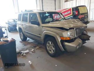 2007 Jeep Commander Sport z VIN 1J8HG48K87C661966, wystawiony jako IAAI lot #42107052 z przebiegiem 183 652 mil mil oraz . Historia ofert i sprzedaży dostępna na DreamBid. Obrazek 1.