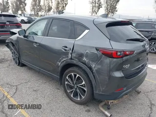 2022 Mazda CX-5 2.5 S Premium Plus Package with VIN JM3KFBEM1N0523105, listed as a IAAI auction lot 41730897 with 64,008 mi miles. Bid and sale history available at carsss.com. Image 3.