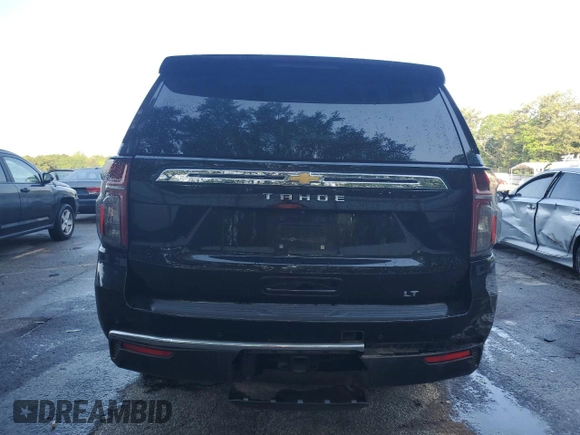 2021 Chevrolet Tahoe LT with VIN 1GNSCNKD8MR120313, listed as a Copart auction lot 56862875 with 125,040 mi miles and Clean title. Bid and sale history available at DreamBid. Image 6.