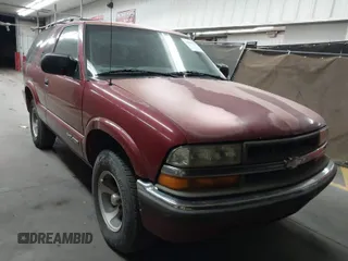2000 Chevrolet Blazer LS z VIN 1GNCS18W0YK120068, wystawiony jako IAAI lot #41997125 z przebiegiem Nie podano mil oraz . Historia ofert i sprzedaży dostępna na DreamBid. Obrazek 1.