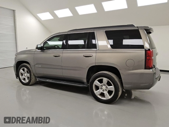 2019 Chevrolet Tahoe LT with VIN 1GNSCBKC0KR100687, listed as a Copart auction lot 53123455 with 104,006 mi miles and Clean title. Bid and sale history available at DreamBid. Image 2.