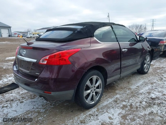 2014 Nissan Murano CrossCabriolet with VIN JN8AZ1FY0EW301566, listed as a IAAI auction lot 41006099 with 168,658 mi miles. Bid and sale history available at carsss.com. Image 4.