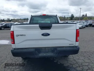 2016 Ford F-150 XL with VIN 1FTMF1C85GKE18267, listed as a IAAI auction lot 41921826 with 122,686 mi miles. Bid and sale history available at carsss.com. Image 16.