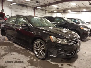 2018 Volkswagen Passat S z VIN 1VWAA7A3XJC039386, wystawiony jako IAAI lot #41585687 z przebiegiem 81 901 mil mil oraz . Historia ofert i sprzedaży dostępna na DreamBid. Obrazek 1.