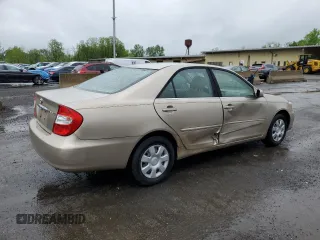 2002 Toyota Camry LE z VIN 4T1BE32K42U623283, wystawiony jako Copart lot #55631065 z przebiegiem 96 830 mil mil oraz Szkoda całkowita • Salvage title. Historia ofert i sprzedaży dostępna na DreamBid. Obrazek 3.