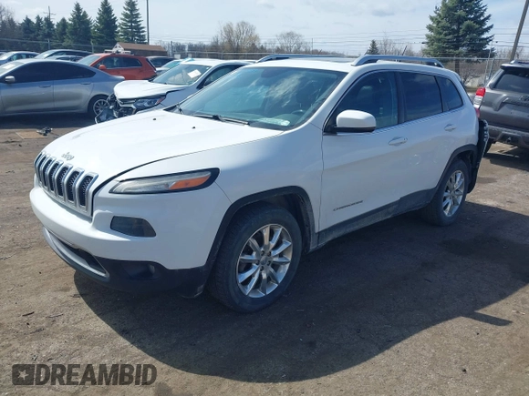2015 Jeep Cherokee Limited with VIN 1C4PJMDS7FW522581, listed as a IAAI auction lot 41870516 with 143,904 mi miles and . Bid and sale history available at DreamBid. Image 2.